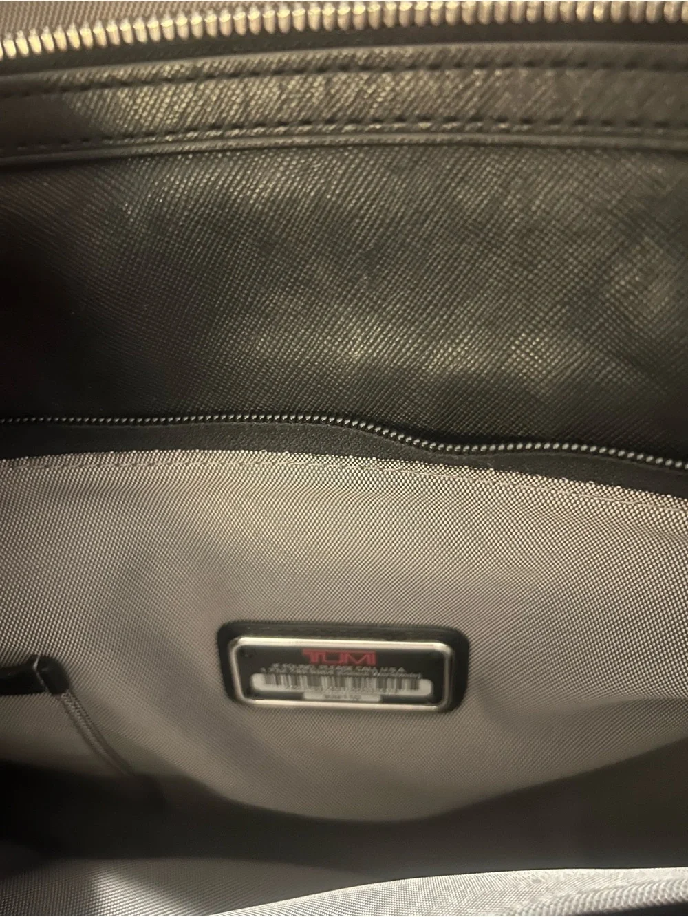 Tumi Black Leather Briefcase with Silver Hardware